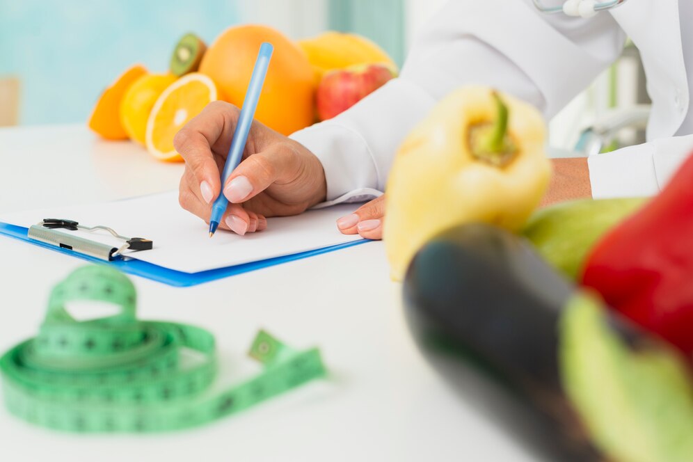 nutricionista com carimbo e assinatura em prescrição